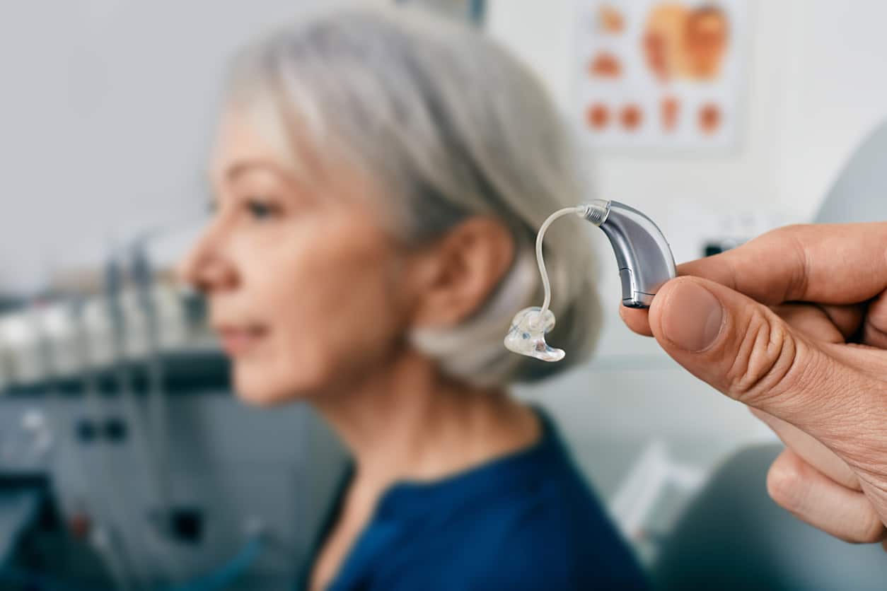 Woman-getting-a-new-hearing-aid-for-her-tinnitus.jpg